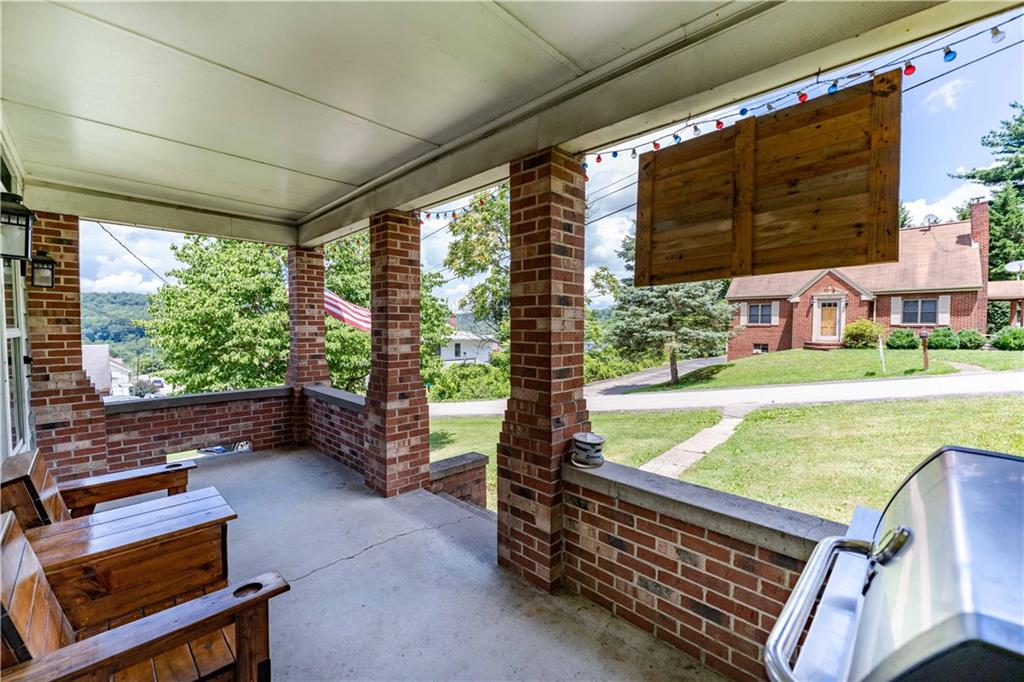 402 Walnut Street Point Marion, PA 15474 - Photo 2 of 19 a outdoor living space with patio and wooden fence