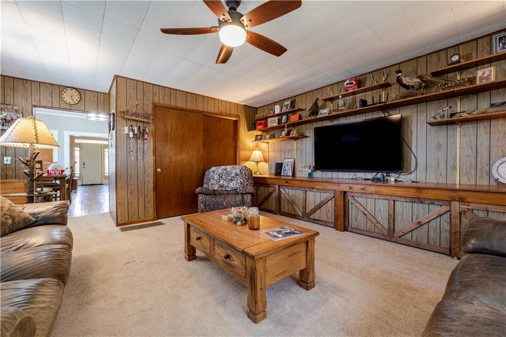 402 Walnut Street Point Marion, PA 15474 - Photo 12 of 19 a living room with furniture and a flat screen tv