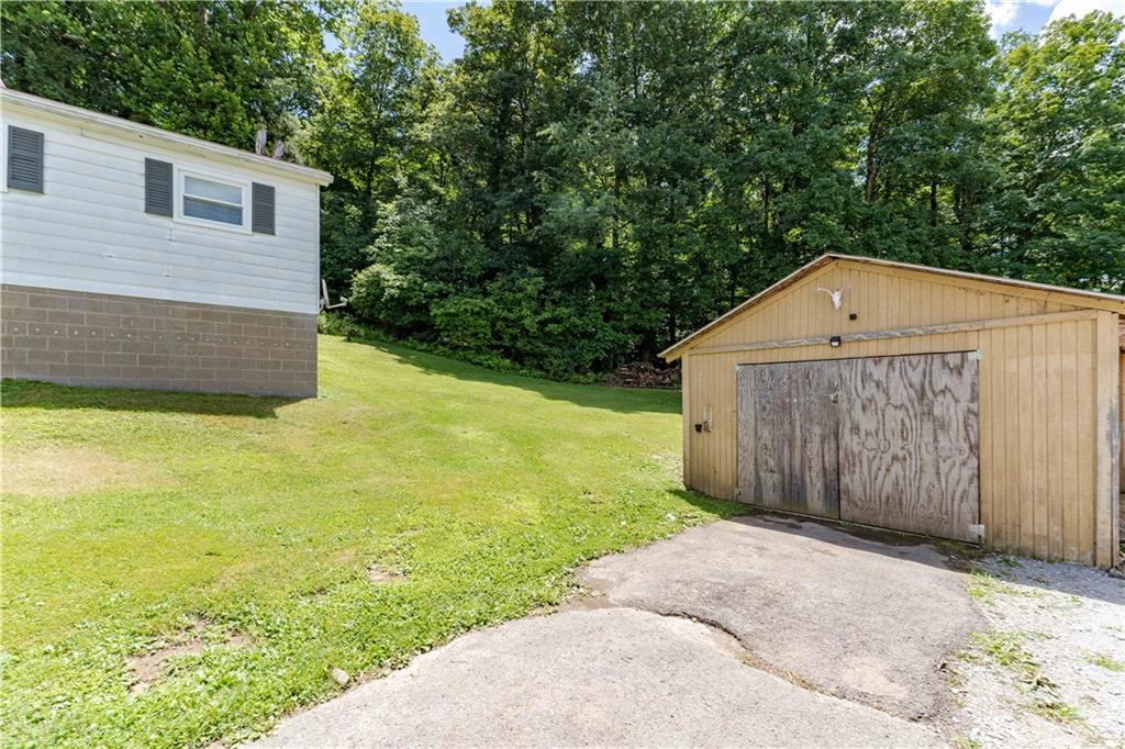 402 Walnut Street Point Marion, PA 15474 - Photo 18 of 19 a view of a back yard of the house