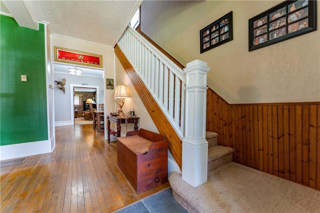 402 Walnut Street Point Marion, PA 15474 - Photo 4 of 19 a view of entryway and hall with wooden floor