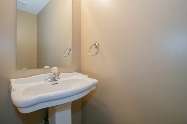 a sink with a mirror