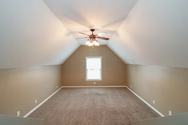 an empty room that has a window