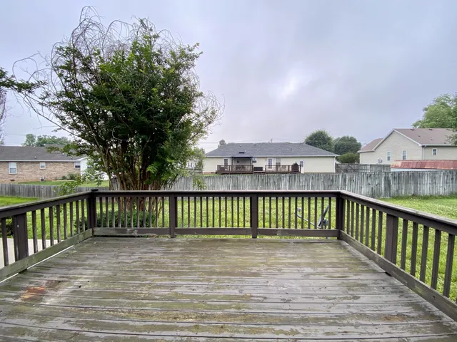 a view of a wooden roof deck