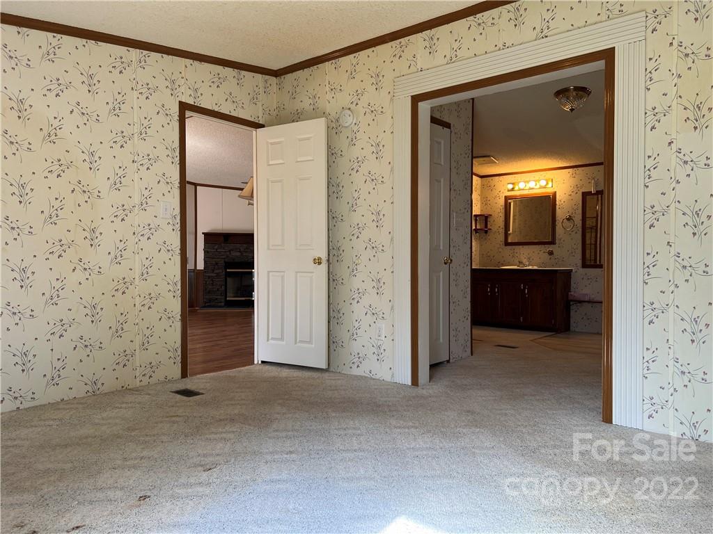 8581 Highway 268 Elkin, NC 28621 - Photo 22 of 45 a view of a bathroom from a hallway