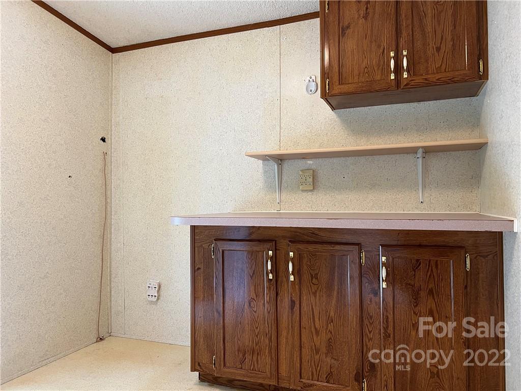 8581 Highway 268 Elkin, NC 28621 - Photo 34 of 45 a close view of wooden cabinets