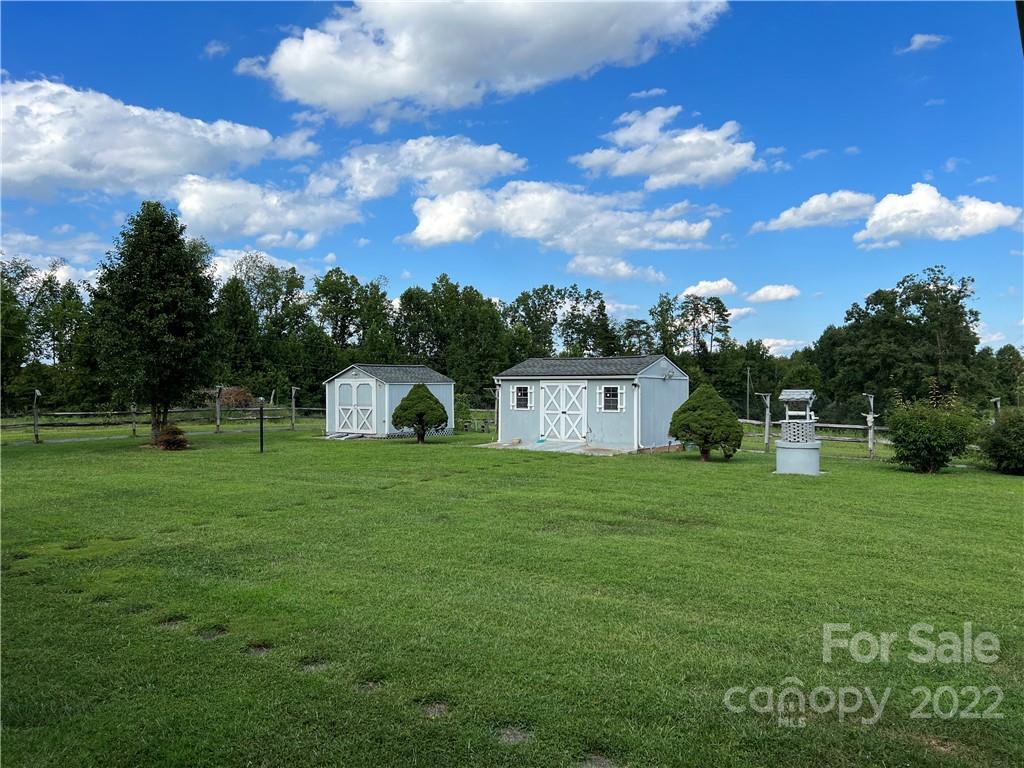 8581 Highway 268 Elkin, NC 28621 - Photo 38 of 45 a front view of a house with a yard