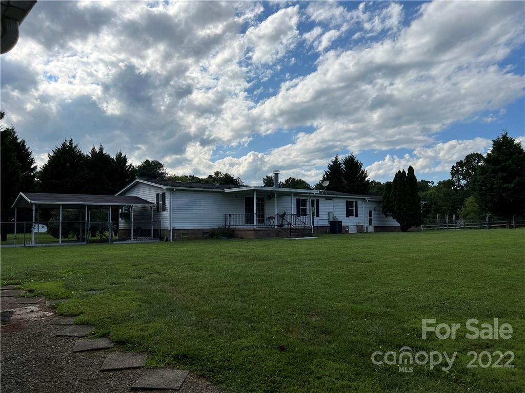 8581 Highway 268 Elkin, NC 28621 - Photo 42 of 45 a view of a big yard in front of a house