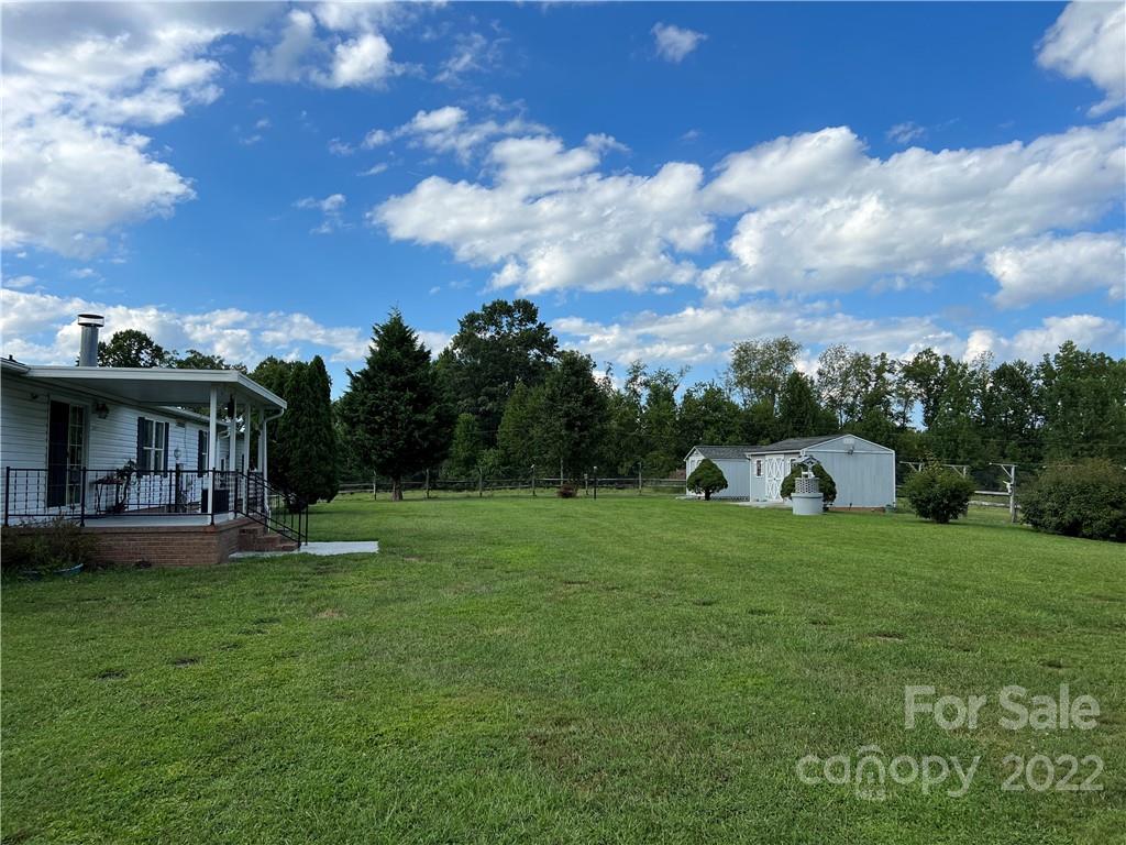 8581 Highway 268 Elkin, NC 28621 - Photo 44 of 45 a front view of a house with garden