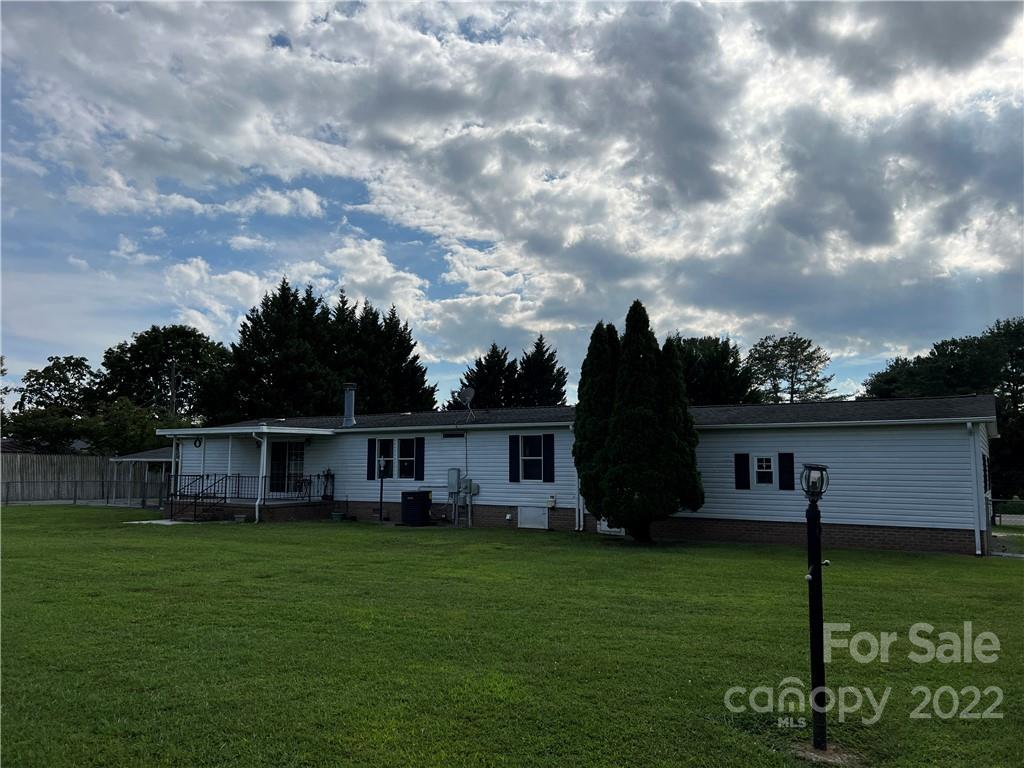 8581 Highway 268 Elkin, NC 28621 - Photo 45 of 45 a view of a house with a backyard