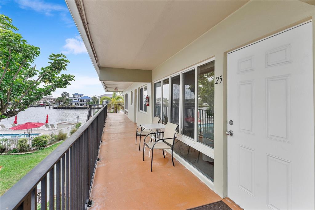 555 North Riverside Drive, Unit 25 Pompano Beach, FL 33062 - Photo 14 of 24 a balcony with chairs