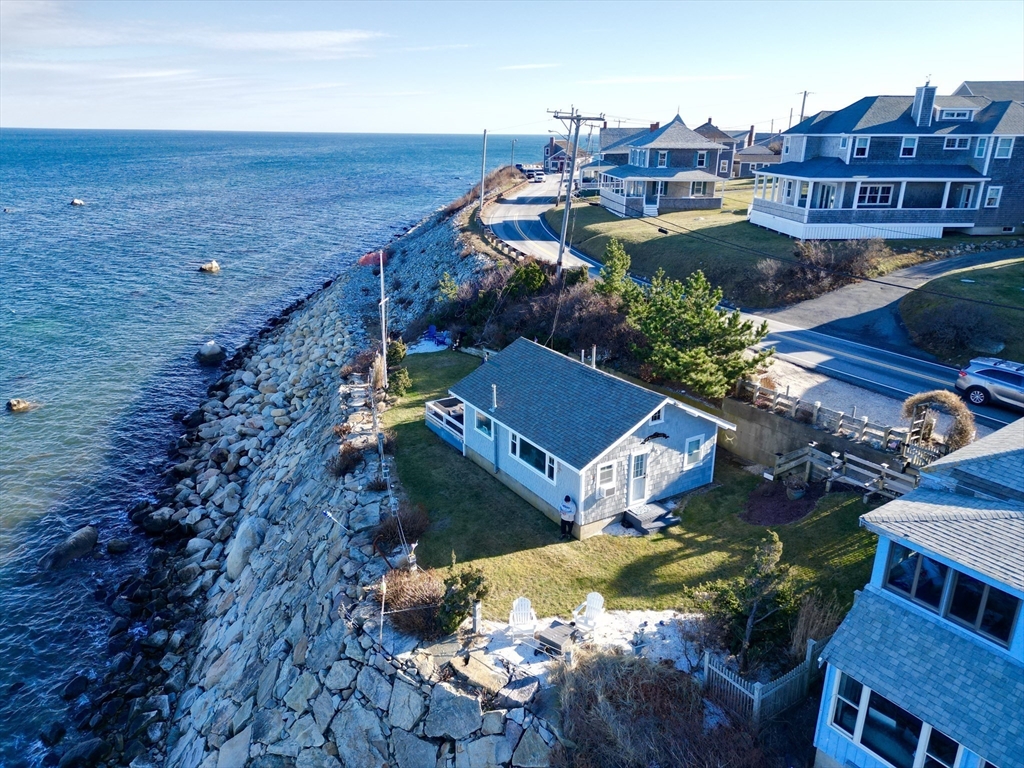 232 Manomet Point Road Plymouth, MA 02360 - Photo 12 of 24 an aerial view of a house with a ocean view
