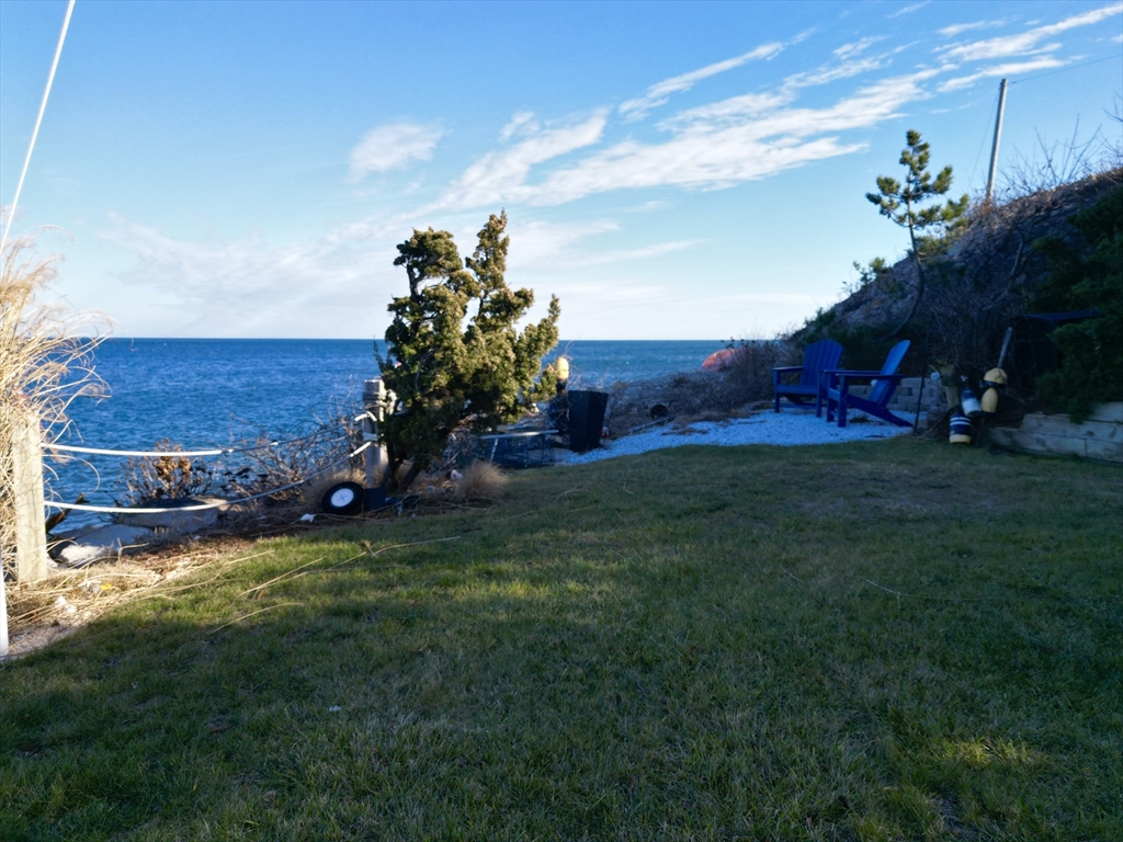 232 Manomet Point Road Plymouth, MA 02360 - Photo 19 of 24 a view of a house with a garden