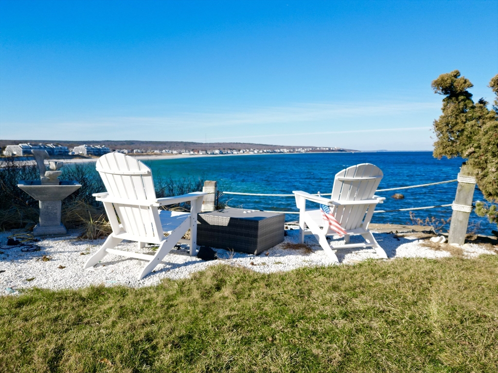 232 Manomet Point Road Plymouth, MA 02360 - Photo 21 of 24 a view of a chairs and table in patio