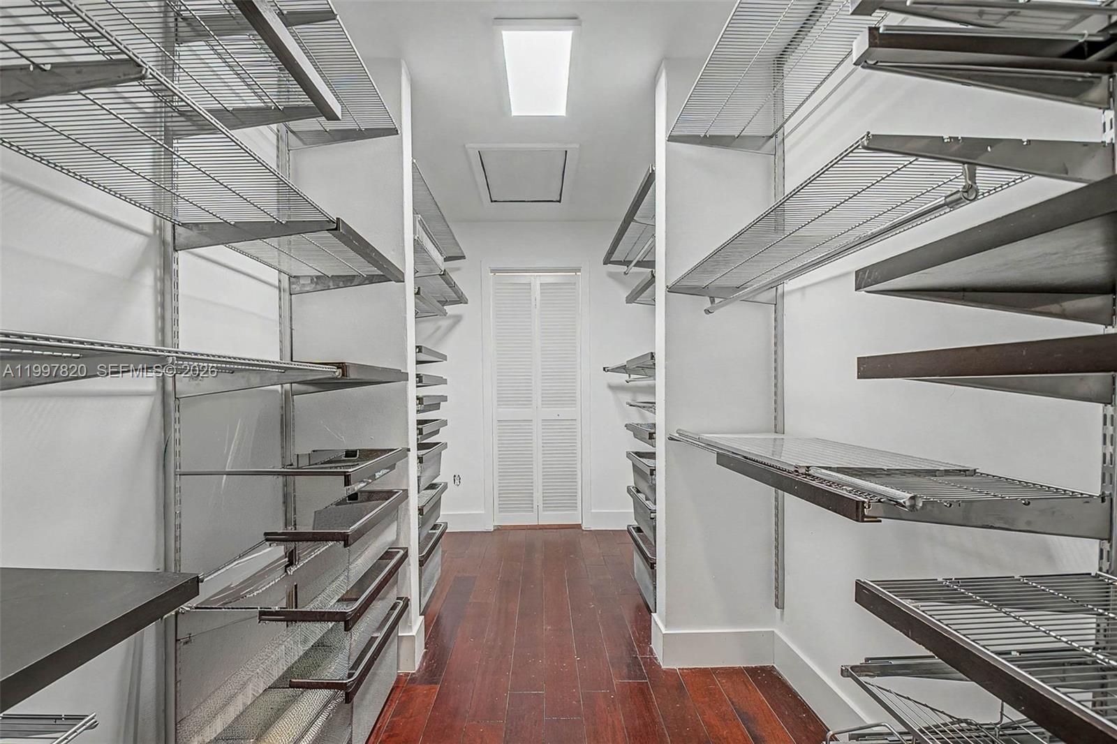 2000 Brickell Avenue, Unit 2004 Miami, FL 33129 - Photo 15 of 23 Primary Closet