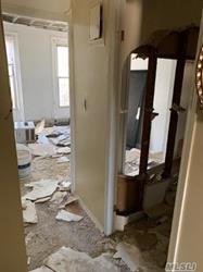 689 Madison Street Brooklyn, NY 11221 - Photo 11 of 20 a bathroom with a granite countertop sink a toilet and a mirror