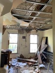 689 Madison Street Brooklyn, NY 11221 - Photo 6 of 20 a living room with a couch