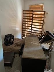 689 Madison Street Brooklyn, NY 11221 - Photo 10 of 20 a bathroom with a sink and a mirror