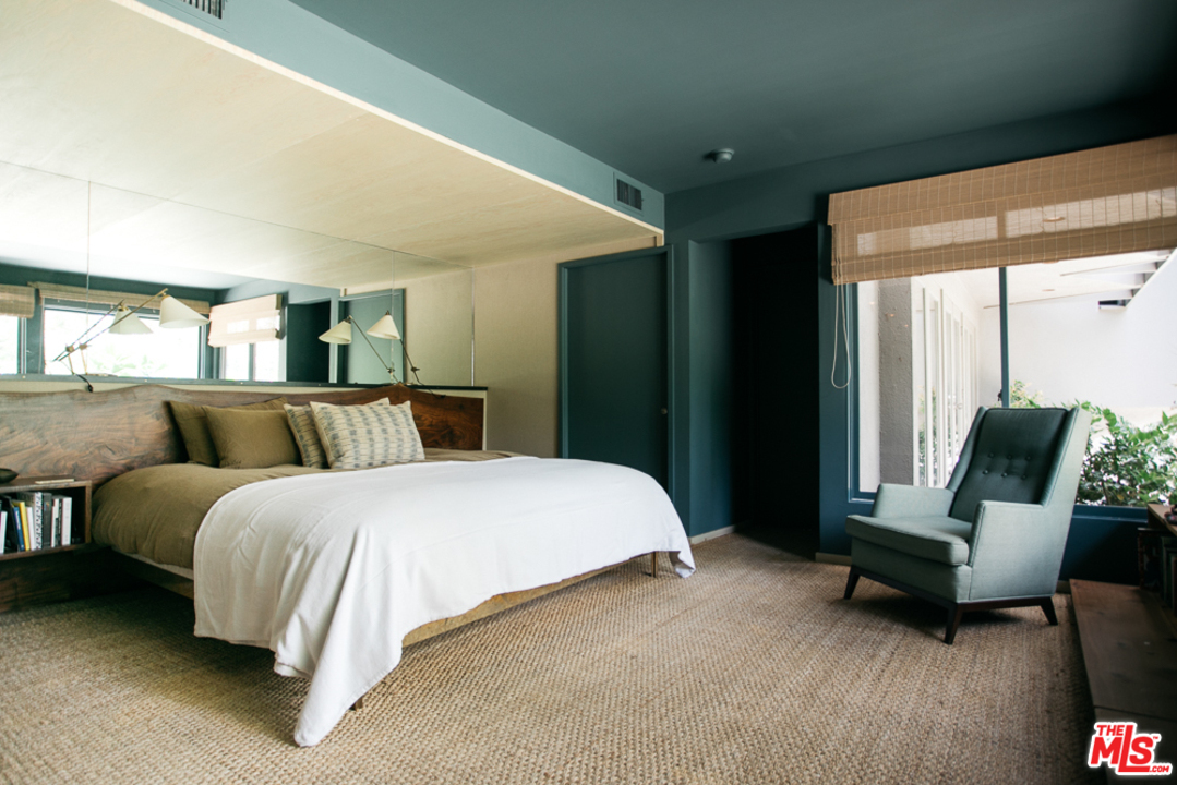 11600 Amanda Drive Studio City, CA 91604 - Photo 20 of 33 a bedroom with a bed and a large window