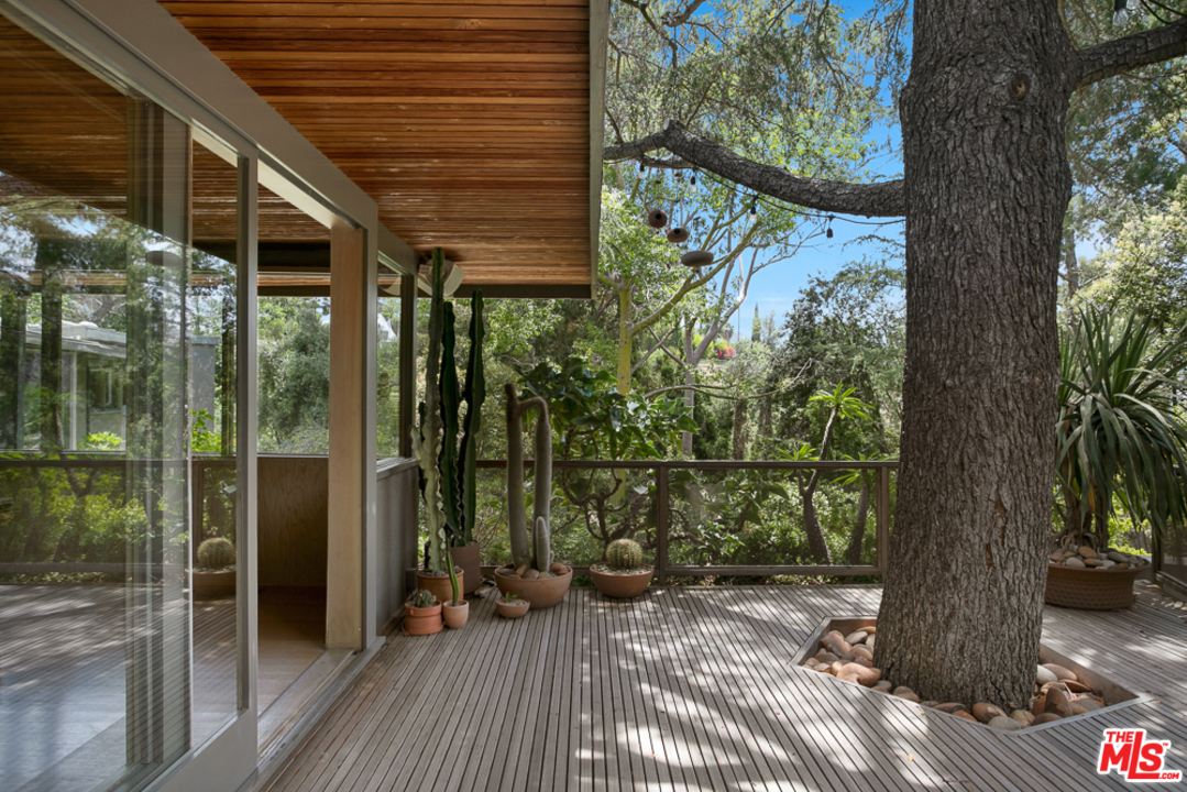 11600 Amanda Drive Studio City, CA 91604 - Photo 23 of 33 a view of a balcony with a tree