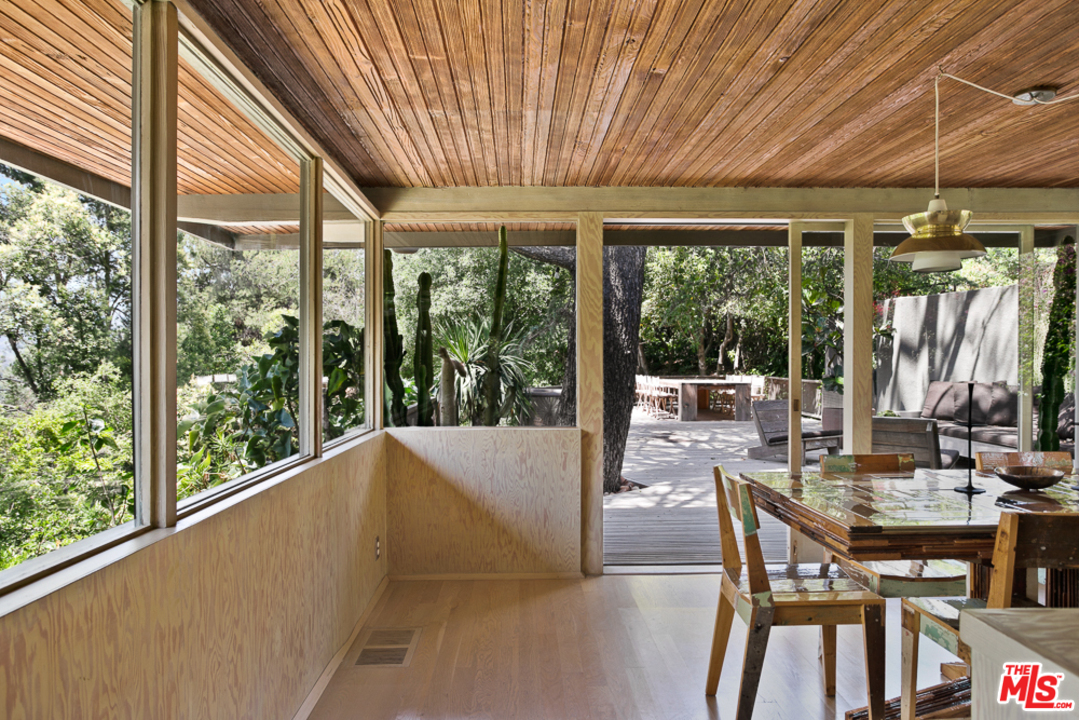11600 Amanda Drive Studio City, CA 91604 - Photo 8 of 33 a view of a dining room with furniture window and outside view