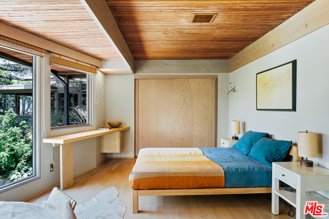 11600 Amanda Drive Studio City, CA 91604 - Photo 10 of 33 a bedroom with a bed and window