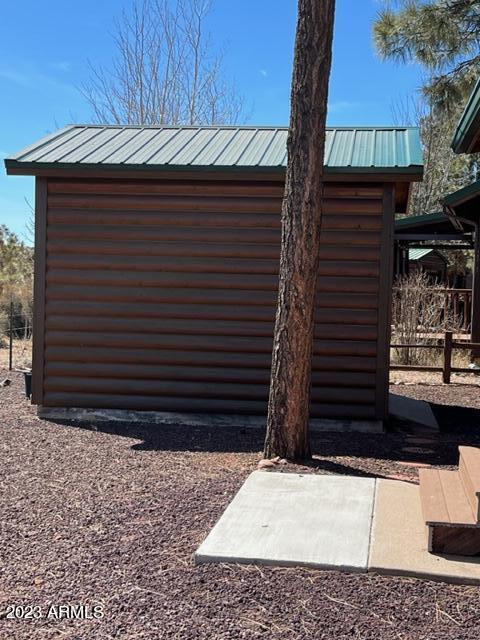 2670 Lodge Loop Overgaard, AZ 85933 - Photo 18 of 20 outside shed for toys