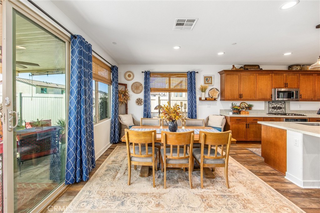 5806 Dragonfly Street Banning, CA 92220 - Photo 19 of 40 a view of a dining room kitchen and furniture