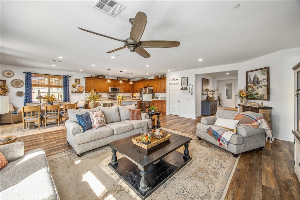 5806 Dragonfly Street Banning, CA 92220 - Photo 26 of 40 a living room with furniture and a view of kitchen