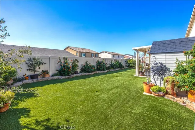 a view of a house with a yard porch and sitting area