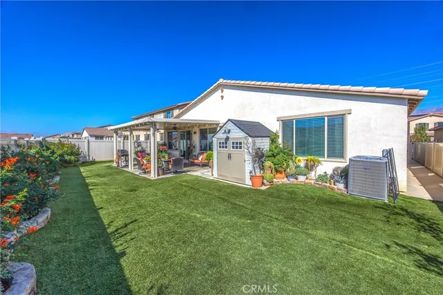 a view of swimming pool with a patio