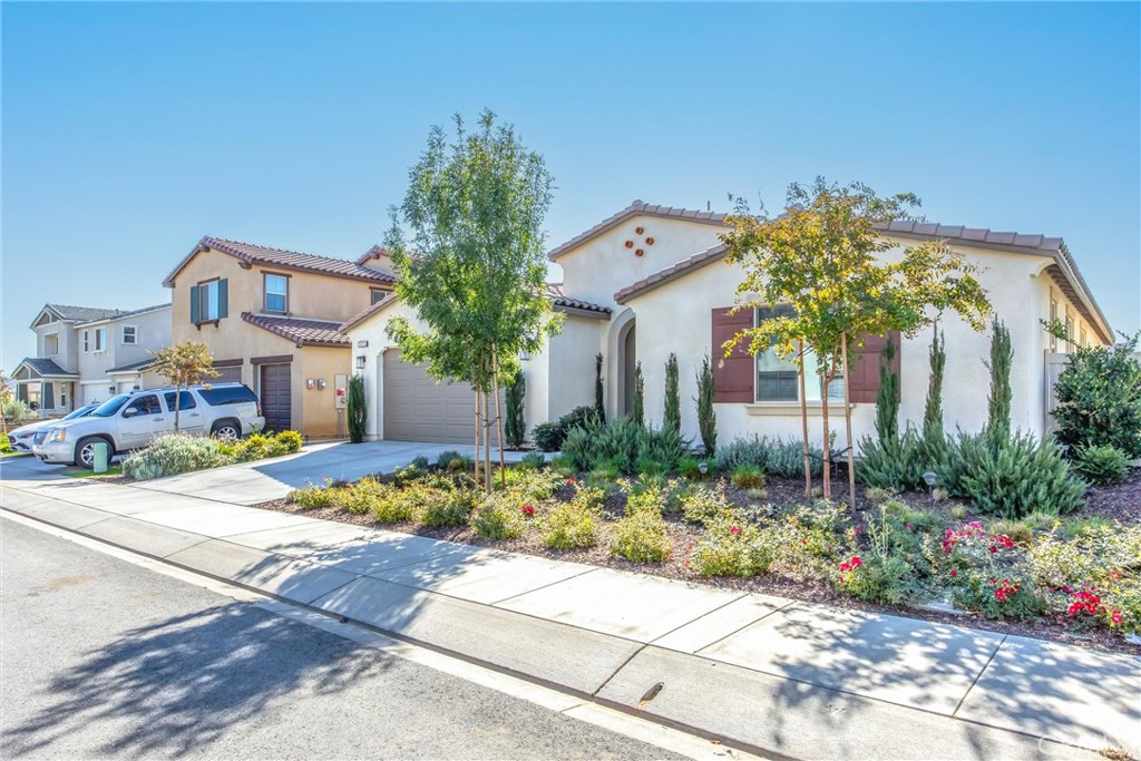 5806 Dragonfly Street Banning, CA 92220 - Photo 4 of 40 a front view of a house with a yard