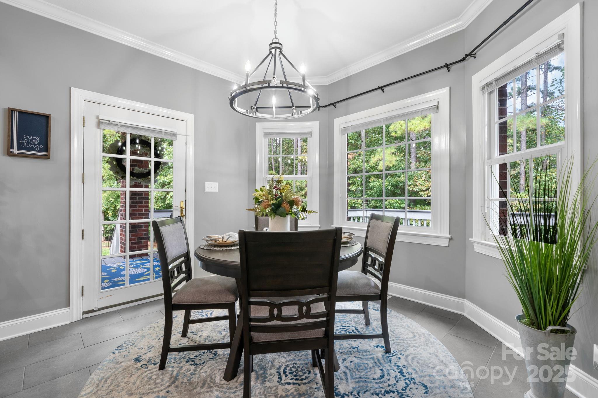 104 Blackhawk Ridge Court Granite Falls, NC 28630 - Photo 15 of 48 a dining room with furniture window and outside view