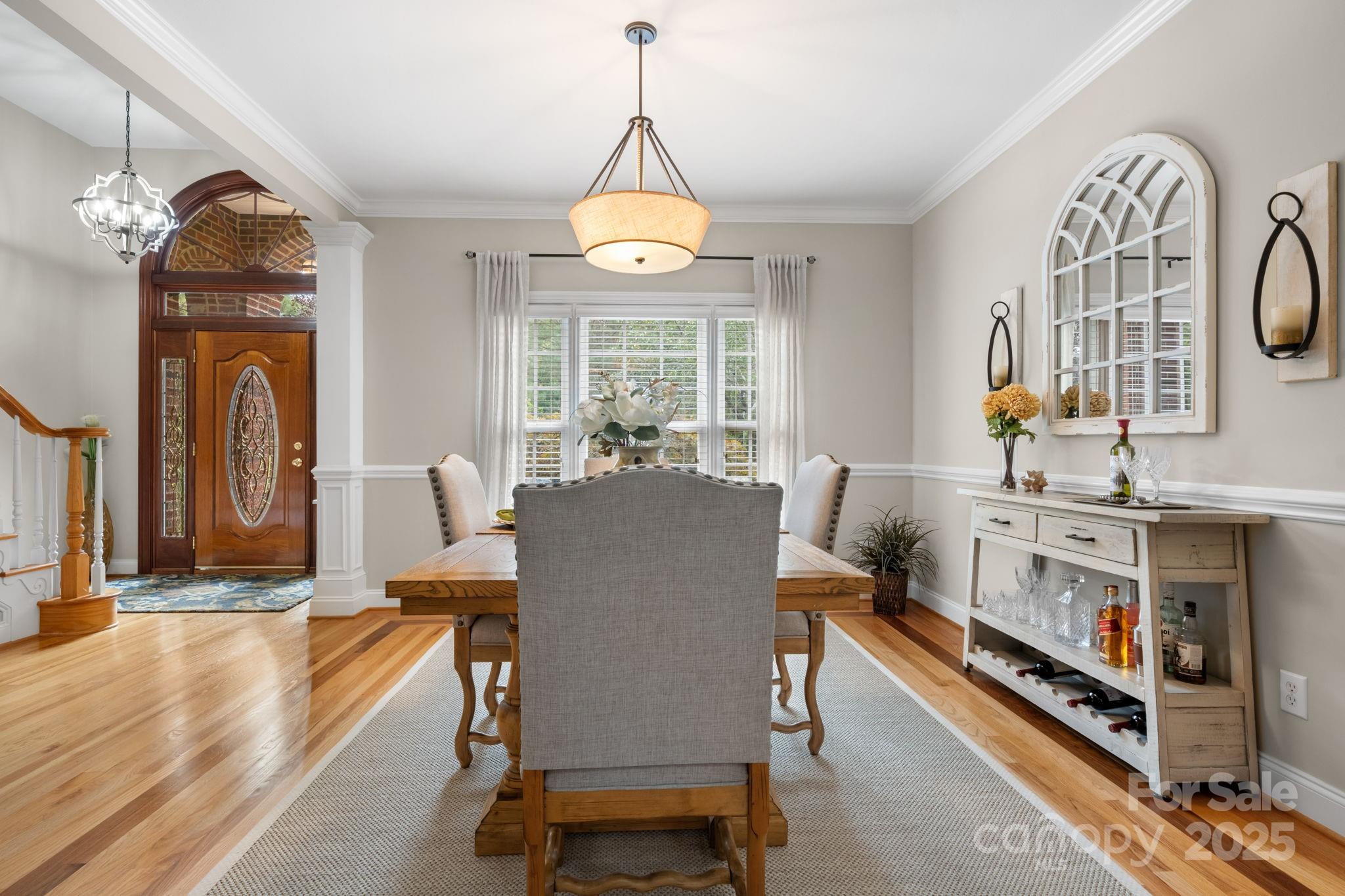 104 Blackhawk Ridge Court Granite Falls, NC 28630 - Photo 16 of 48 a dining room with furniture window and wooden floor
