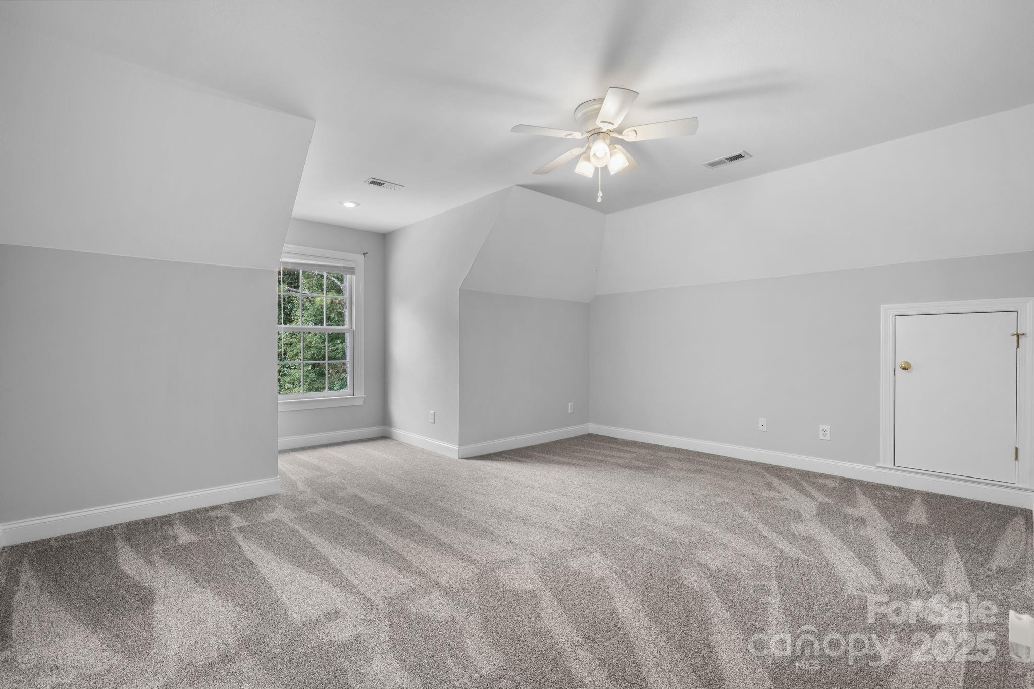 104 Blackhawk Ridge Court Granite Falls, NC 28630 - Photo 30 of 48 a view of an empty room with a window