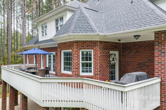 a view of a house with a roof deck
