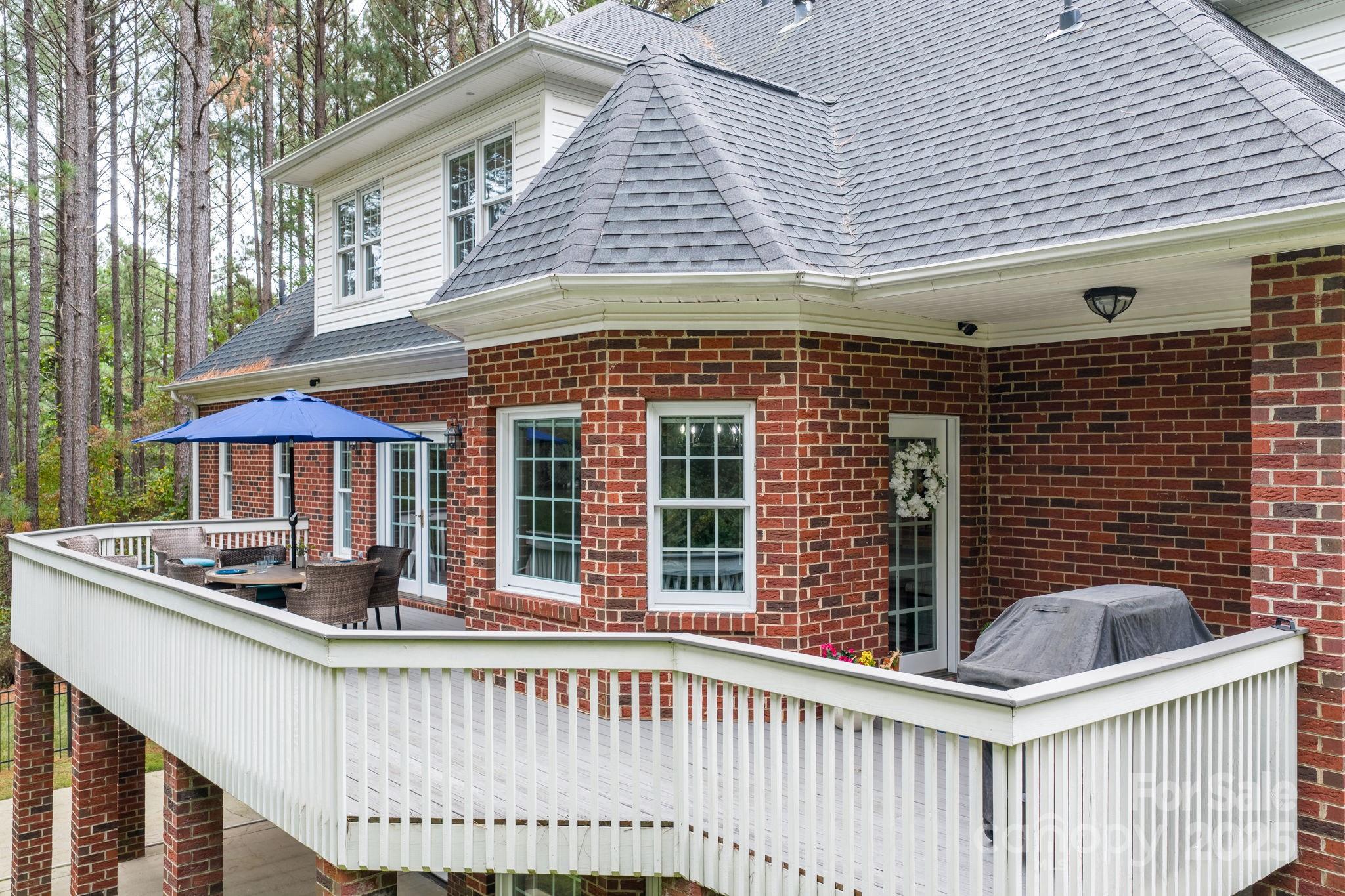 104 Blackhawk Ridge Court Granite Falls, NC 28630 - Photo 42 of 48 a view of a house with a roof deck