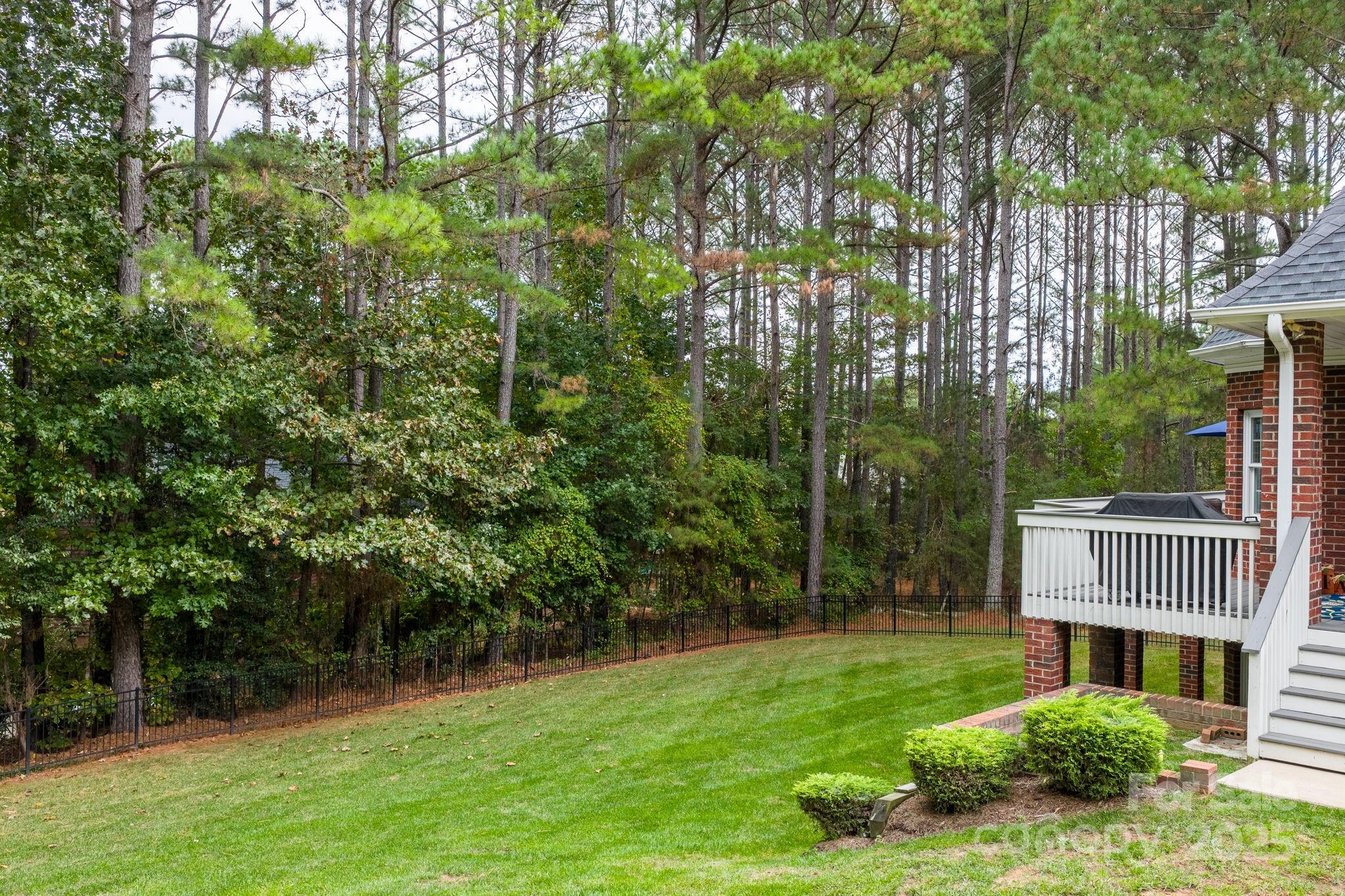 104 Blackhawk Ridge Court Granite Falls, NC 28630 - Photo 47 of 48 a view of a house with a yard