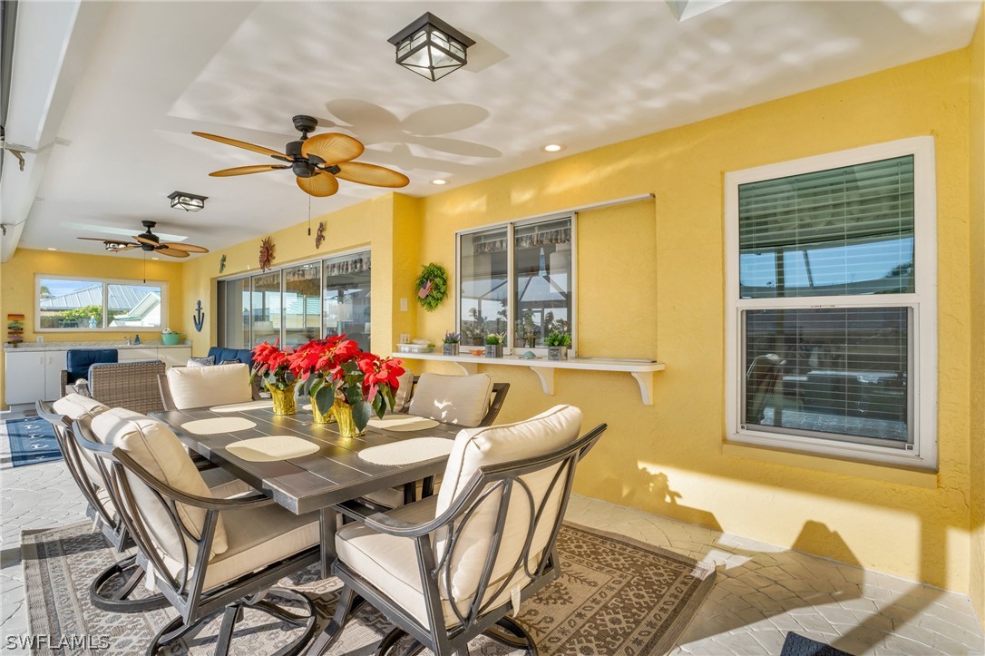 3278 York Road St. James City, FL 33956 - Photo 17 of 49 a dining room with furniture and window