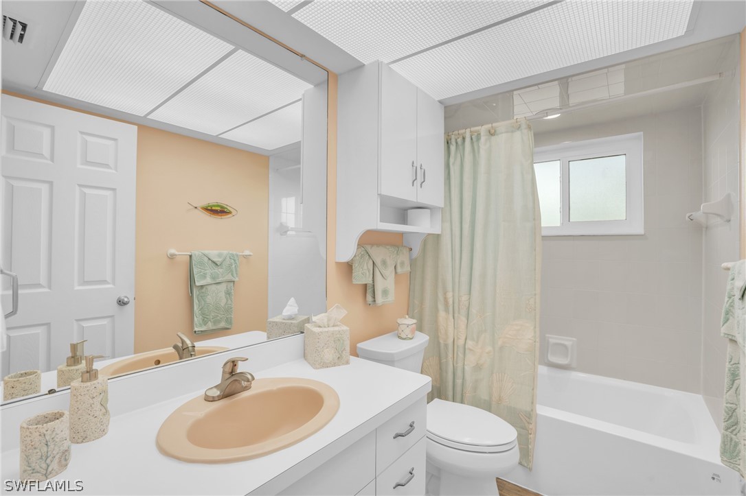 3278 York Road St. James City, FL 33956 - Photo 36 of 49 a bathroom with a sink toilet and shower
