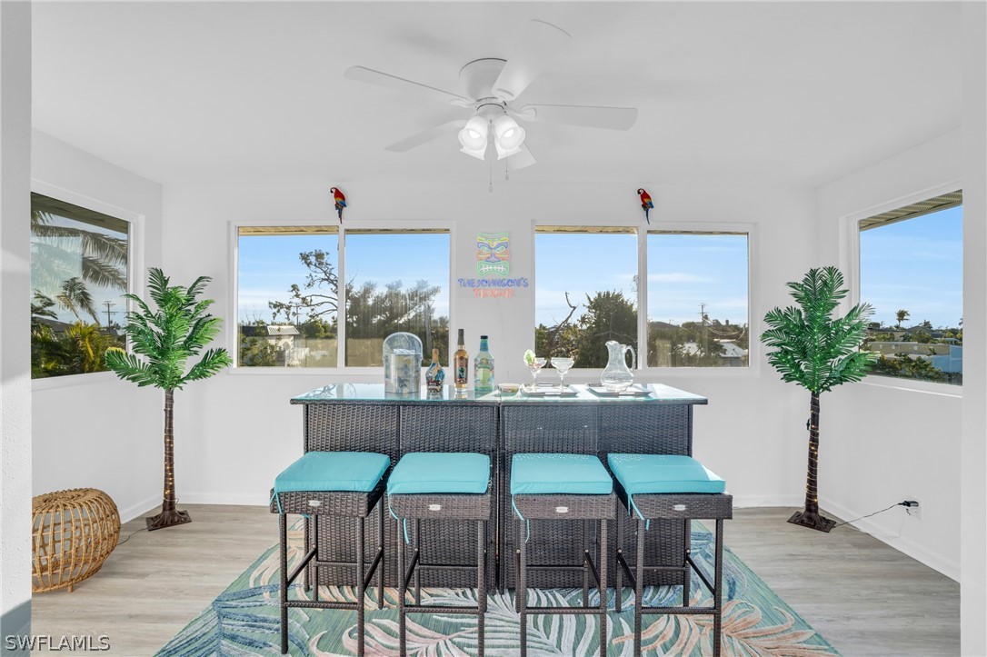 3278 York Road St. James City, FL 33956 - Photo 41 of 49 a dining room with furniture and window