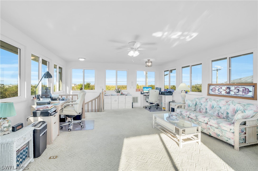 3278 York Road St. James City, FL 33956 - Photo 42 of 49 a living room with furniture and kitchen view