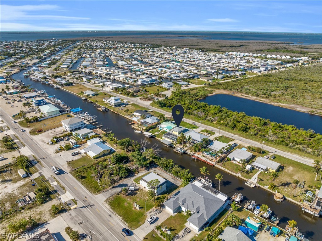 3278 York Road St. James City, FL 33956 - Photo 46 of 49 an aerial view of residential building and ocean