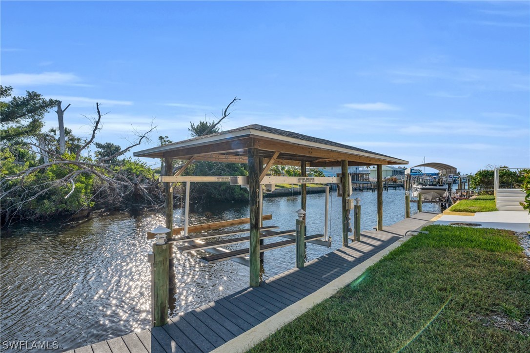 3278 York Road St. James City, FL 33956 - Photo 5 of 49 a view of a house with backyard and sitting area