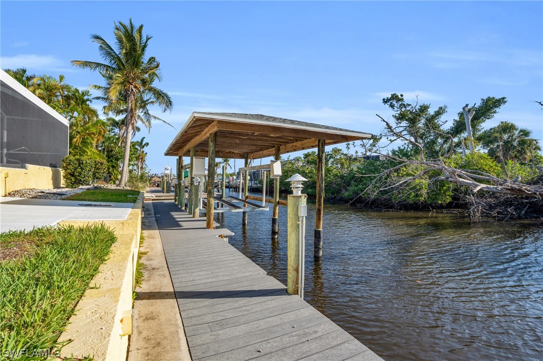 3278 York Road St. James City, FL 33956 - Photo 6 of 49 a view of a swimming pool with a patio