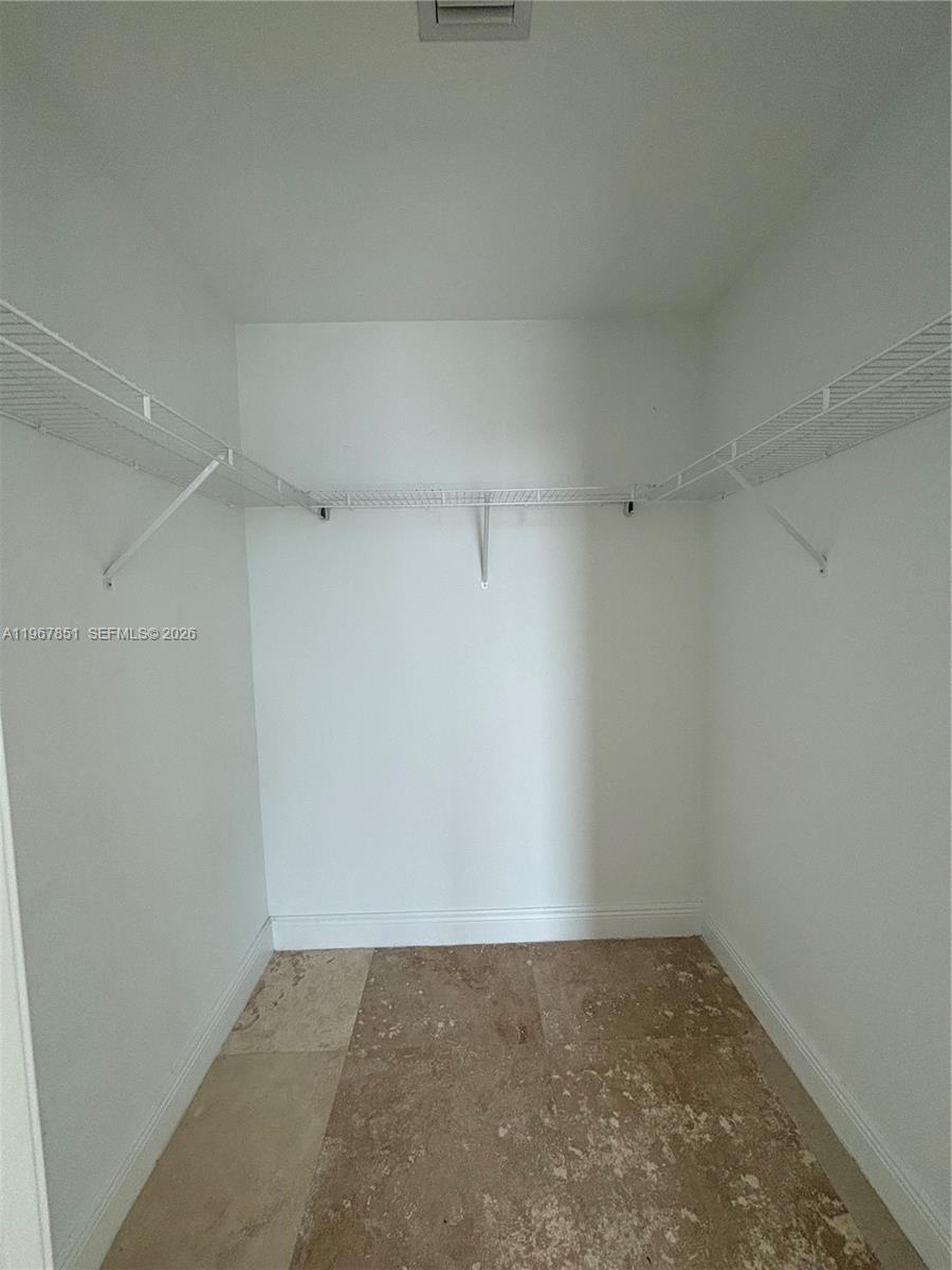 79 Southwest 12th Street, Unit 2703S Miami, FL 33130 - Photo 25 of 61 Second bedroom walking closet