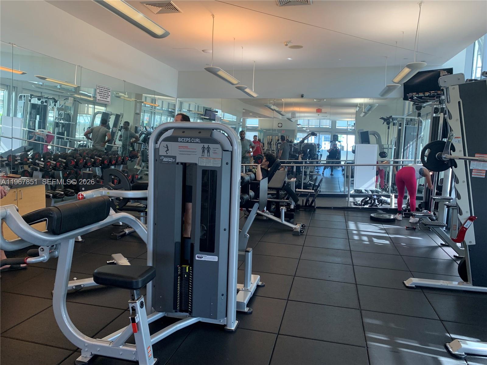 79 Southwest 12th Street, Unit 2703S Miami, FL 33130 - Photo 39 of 61 a view of a room with gym equipment