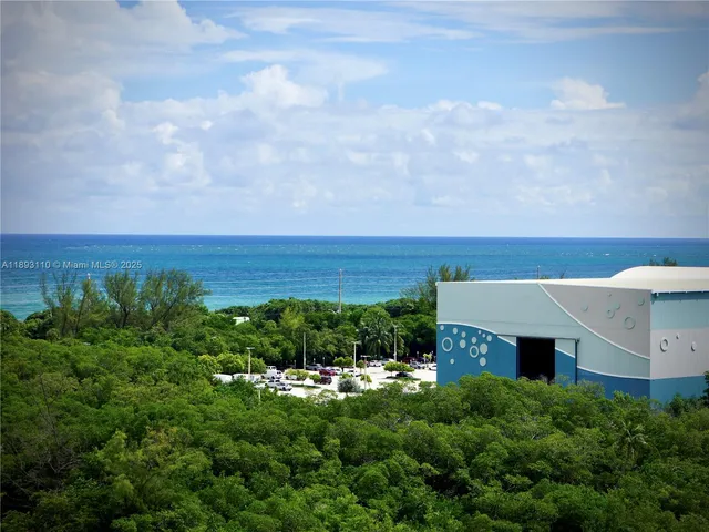 a kitchen with stainless steel appliances a refrigerator and a sink