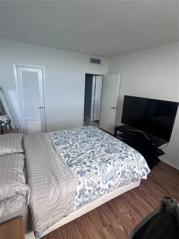 a kitchen with stainless steel appliances granite countertop a sink and stove top oven
