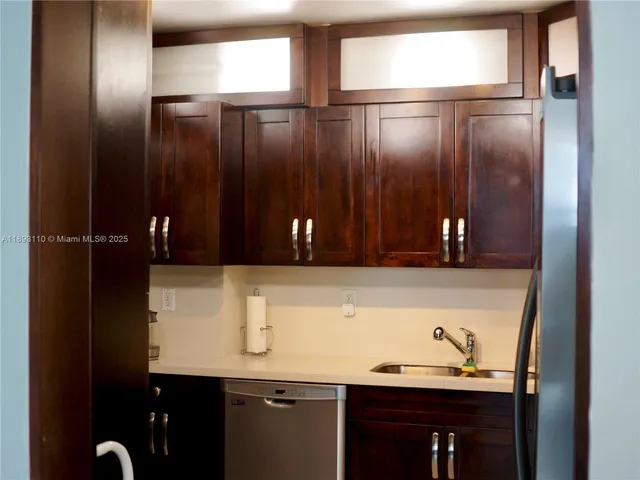 a bedroom with bed and window