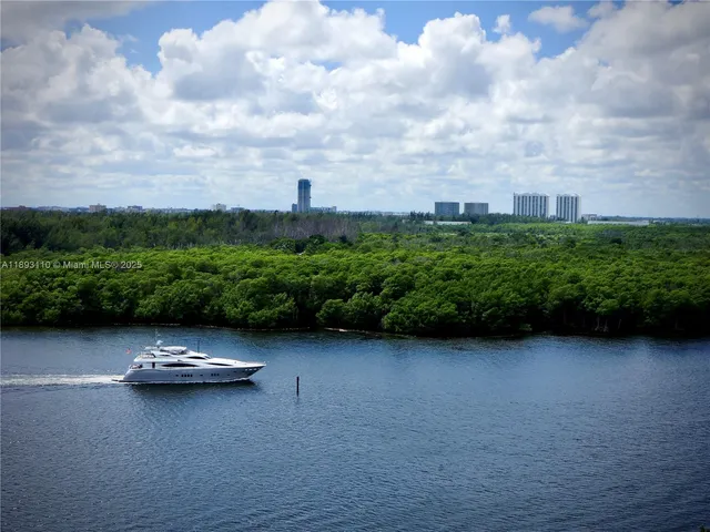 a view of a bathroom with a sink and wooden floor
